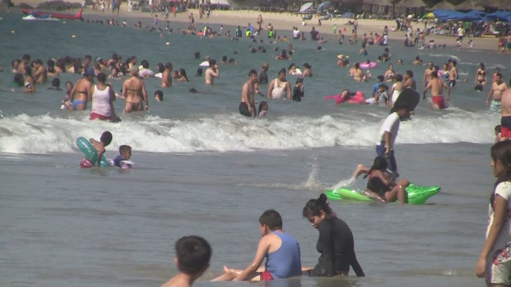 playa-llena-la-ropa